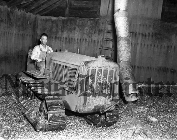 1938-9-20 Tractor packing agricultural silage