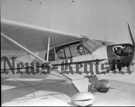 1945-8-23 Airport Flight School operators and Planes.jpeg