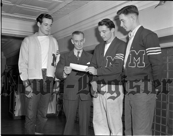 1946-2 Infantile paralysis drive, Mac-hi lettermen give check to E.V. Blair (left to right, Don Fulham, Blair, Jim Hart, Malcolm Marsh.jpeg