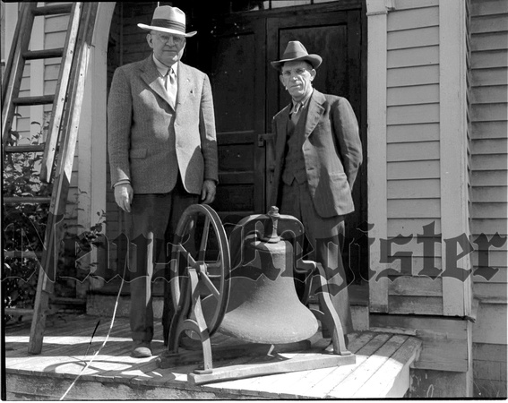 1946-7 A.A. Anderson gives school bell to Bro.-in-law for African mission use.jpeg