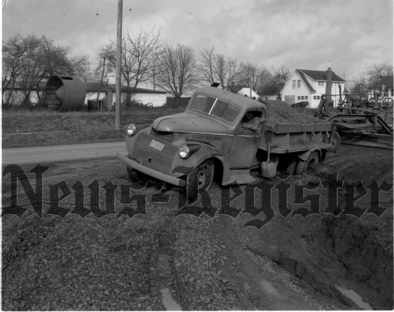 1950-2-3 County gravel truck mired in mud 1.jpeg