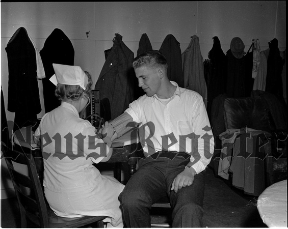 1945-5-24 Sgt Roger Todd of Dayton former German POW gives blood for Red Cross.jpeg