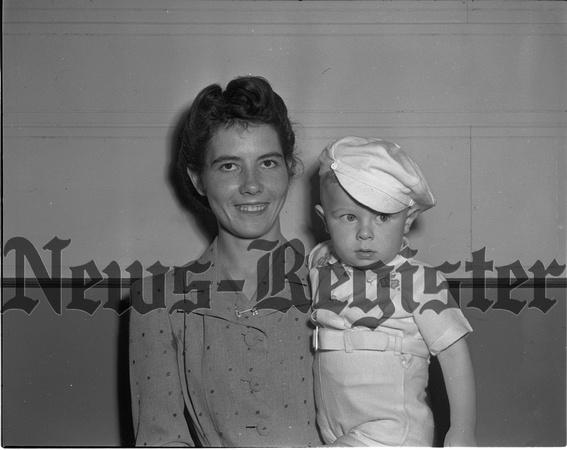 1946-5-30 Australian bride Mrs. E.K. Kaufman and son John.jpeg