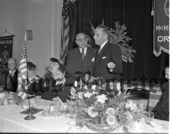 1946-1 Judge Arlie G. walker recieves governor's pin form retering district gov. Frank Taylor at McMinnville Banquet.jpeg