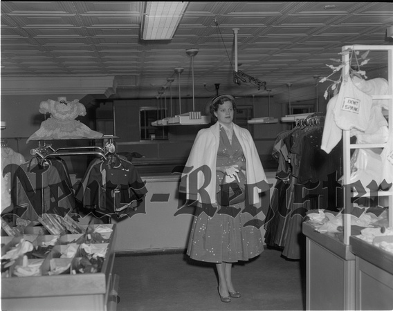 1955-3-19 Carol Booth models Penny's fashion 1.jpeg