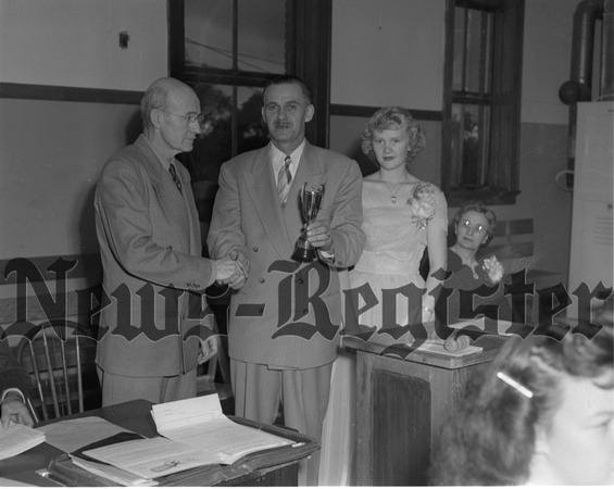 1951-11 Eagles, C.N. Bennett presented membership award 1.jpeg