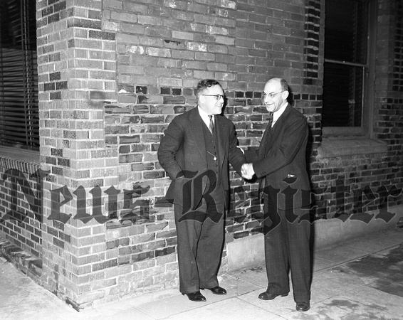 1940-12 Kiwanis president A.G. Noble & outgoing Harold Elkinton