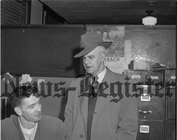 1950-3-7 Osborne, S. James conversing with Bill Powell at T-R.jpeg