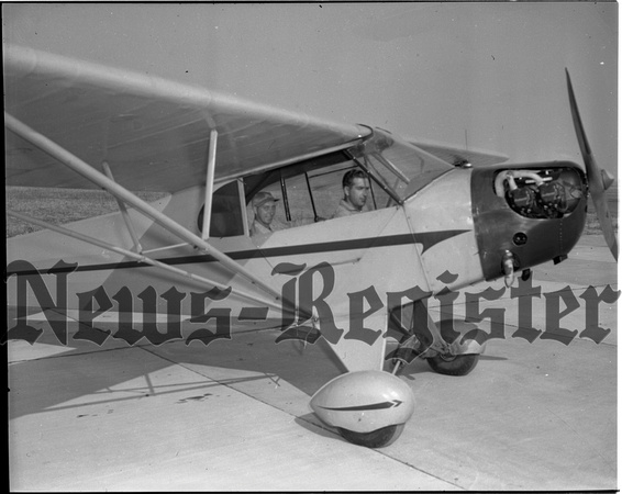 1945-8-23 Airport Flight School operators and Planes 7.jpeg