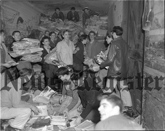 1945-3 Waste Paper Unloading H.S and Jr. H.S Boys.jpeg