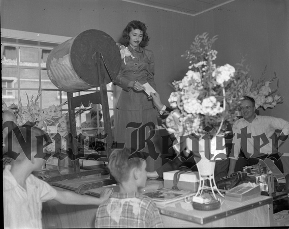 1949-7-16 Farnham electric grand opening with Miss McMinnville.jpeg