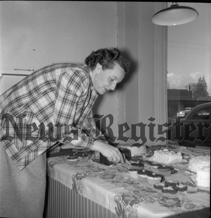 1953-2-17 Mrs. Harold Parker, Mrs. PN Ediger Extension food sale 1.jpeg