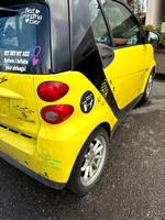 yellow car, stickers